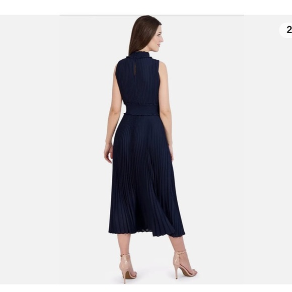 Fabulous LBD blouson dress featuring a smocked waist & accordion pleats - Picture 2 of 15